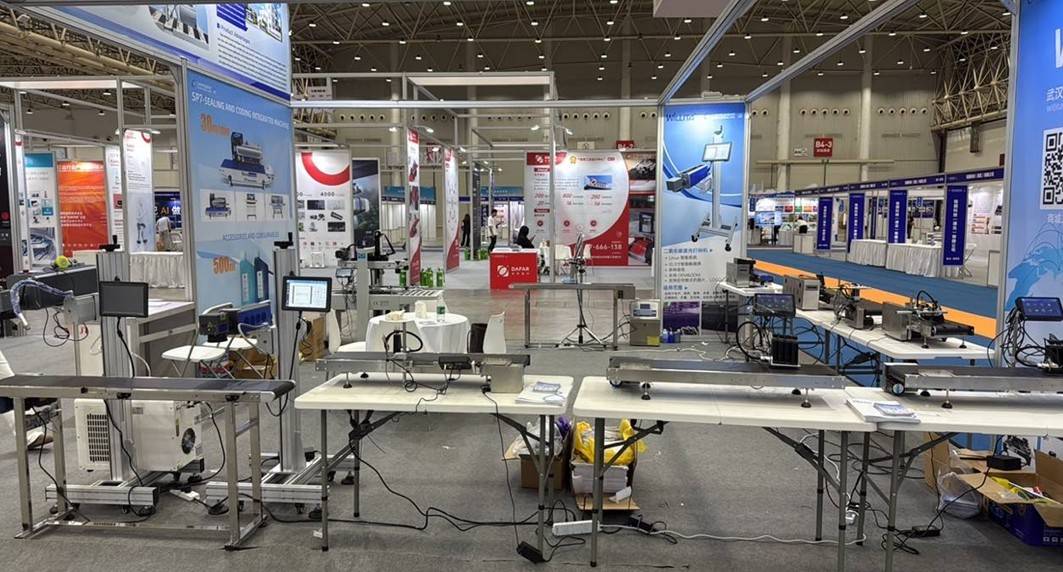Willita coding and marking equipment displayed with conveyor systems
